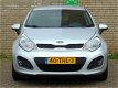 Kia Rio - 1.2 Super Pack | Airco | Cruise control | Lichtmetalen velgen 17 inch | Bluetooth | 100% O - 1 - Thumbnail