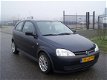 Opel Corsa - 1.4-16V Sport - 1 - Thumbnail