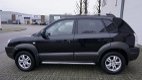 Hyundai Tucson - 2.0i Dynamic Cross org km stand - 1 - Thumbnail