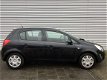 Opel Corsa - 1.2-16V Rhythm, AIRCO, BLUETOOTH, PARKSENSOR ACHTER - 1 - Thumbnail