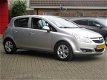 Opel Corsa - 1.2-16V Edition Automaat | AIRCO | CRUISE CONTROL | CARKIT | INCL. BOVAG GARANTIE - 1 - Thumbnail