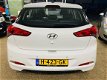 Hyundai i20 - 1.2 HP i-Motion AIRCO / ACHTERUIT RIJ CAMERA / BOMVOL / ACTIE - 1 - Thumbnail