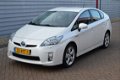 Toyota Prius - 1.8 Dynamic Business O.a: Clima, 17 Inch L.m., Afn. trekhaak, Camera - 1 - Thumbnail