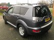 Mitsubishi Outlander - 2.2 DI-D 4WD VAN GRIJS KENTEKEN 2000 KG TREKGEWICHT 6 MND GAR € 7900 EXCL Aut - 1 - Thumbnail