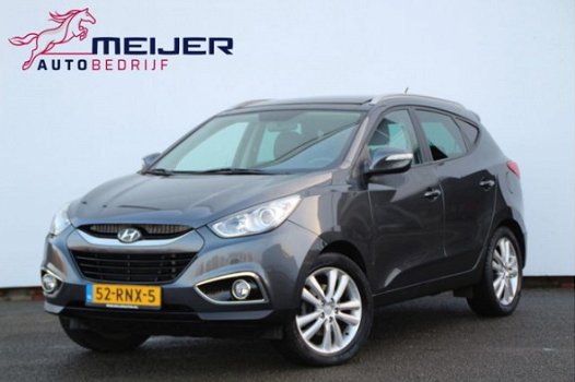 Hyundai ix35 - 2.0 CRDi HP 4WD i-Catcher Panoramadak | Leer | Navigatie | Stoelverw | Trekhaak - 1