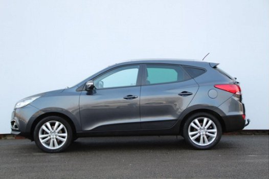 Hyundai ix35 - 2.0 CRDi HP 4WD i-Catcher Panoramadak | Leer | Navigatie | Stoelverw | Trekhaak - 1