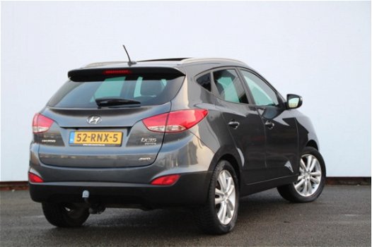 Hyundai ix35 - 2.0 CRDi HP 4WD i-Catcher Panoramadak | Leer | Navigatie | Stoelverw | Trekhaak - 1