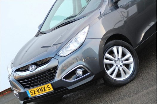 Hyundai ix35 - 2.0 CRDi HP 4WD i-Catcher Panoramadak | Leer | Navigatie | Stoelverw | Trekhaak - 1