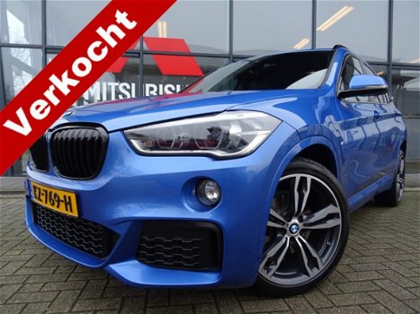 BMW X1 - sDrive18i Centennial High Executive *AUTOMAAT*NAVIGATIE*LEDER* DEALER ONDERHOUDEN - 1