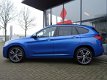 BMW X1 - sDrive18i Centennial High Executive *AUTOMAAT*NAVIGATIE*LEDER* DEALER ONDERHOUDEN - 1 - Thumbnail