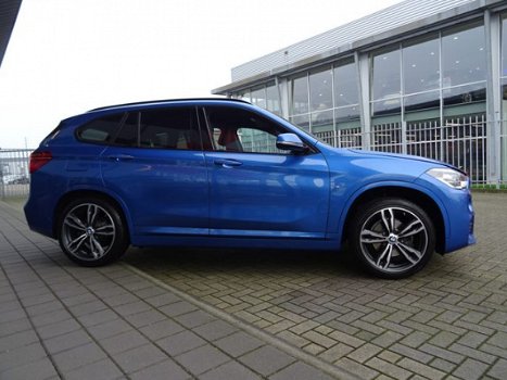 BMW X1 - sDrive18i Centennial High Executive *AUTOMAAT*NAVIGATIE*LEDER* DEALER ONDERHOUDEN - 1