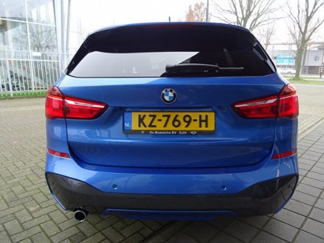 BMW X1 - sDrive18i Centennial High Executive *AUTOMAAT*NAVIGATIE*LEDER* DEALER ONDERHOUDEN - 1