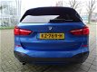 BMW X1 - sDrive18i Centennial High Executive *AUTOMAAT*NAVIGATIE*LEDER* DEALER ONDERHOUDEN - 1 - Thumbnail