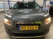 Citroën C4 Cactus - 1.2 PureTech Shine AUTOMAAT, NAVI, CAMERA, 34.000 KM - 1 - Thumbnail