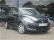 Suzuki Swift - 1.2 30 jahre edition 5 deurs Airco/MTF-stuur/Lm velgen 1e eigenaar/Dealer OH - 1 - Thumbnail