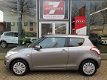 Suzuki Swift - 1.2 Comfort EASSS Airco, Radio CD/USB, Stoelverwarming, Elektrische ramen/spiegels - 1 - Thumbnail