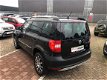 Skoda Yeti - 1.2 TSI Adventure navigatie + lock, cruise control, climatronic, pdc achter, hoge insta - 1 - Thumbnail