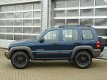 Jeep Cherokee - 2.4i Sport Plus bj.2004 Apk nieuw | Trekhaak | 4wd - 1 - Thumbnail