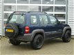 Jeep Cherokee - 2.4i Sport Plus bj.2004 Apk nieuw | Trekhaak | 4wd - 1 - Thumbnail