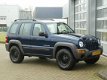 Jeep Cherokee - 2.4i Sport Plus bj.2004 Apk nieuw | Trekhaak | 4wd - 1 - Thumbnail