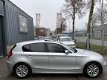 BMW 1-serie - 118i Navigatie, ECC, Schuifdak, Stoelverwarming - 1 - Thumbnail