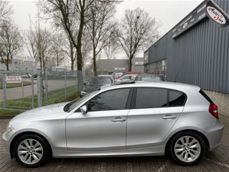 BMW 1-serie - 118i Navigatie, ECC, Schuifdak, Stoelverwarming - 1