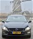 Volvo V60 - 2.4 D6 AWD Plug-In Hybrid R-Design BTW/ Dealer auto - 1 - Thumbnail