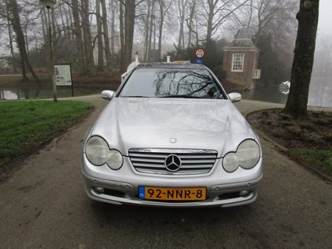 Mercedes-Benz C-klasse Sportcoupé - 200 K. automaat.lederen bekleding.panoramadak.parkeersensoren.na - 1