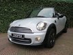 Mini Mini Cabrio - 1.6 Cooper Chili R57 LCI met Navi, HK Hifi, Xenon en Leder - 1 - Thumbnail