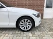 BMW 1-serie - 114i EDE |Airco|5deurs|Stoelverm|PDC|Wit - 1 - Thumbnail