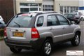 Kia Sportage - 2.0 CVVT 2WD Comfort - 1 - Thumbnail