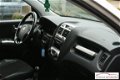 Kia Sportage - 2.0 CVVT 2WD Comfort - 1 - Thumbnail