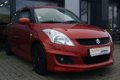 Suzuki Swift - 1.2 Exclusive X-cite + KEYLESS + KLIMA + LEDER PAKKET + LM VELGEN - 1 - Thumbnail