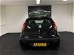 Peugeot 107 - 1.0-12V XR 2006 Zwart - Stuurbekrachtiging - AUX - NAP - 1 - Thumbnail