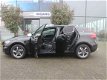 Volvo V40 - 2.0 D2 R-Design Business 1e EIG NAVI XENON CRUISE NL AUTO - 1 - Thumbnail