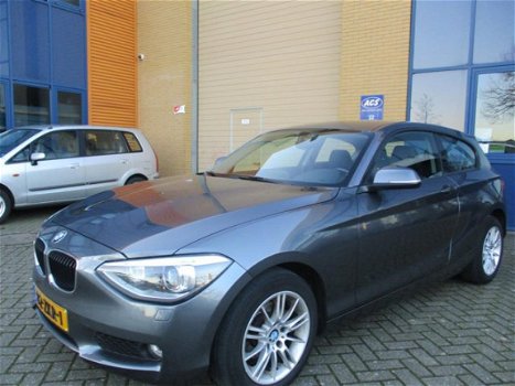 BMW 1-serie - 114i Business+ Leder/PDC/Navi/sportbak - 1