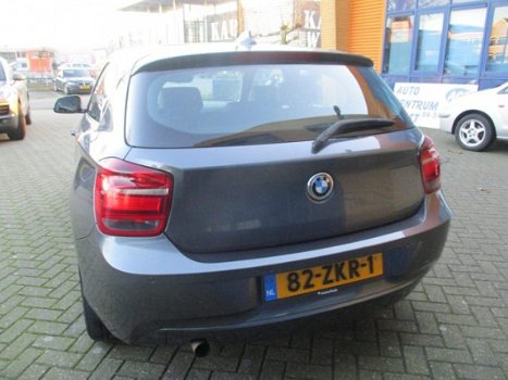 BMW 1-serie - 114i Business+ Leder/PDC/Navi/sportbak - 1