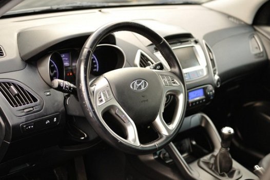 Hyundai ix35 - 2.0i Style / leer / Navigatie / Zeer compleet - 1
