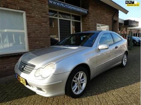 Mercedes-Benz C-klasse Sportcoupé - 180 Leder / Airco / Dealeronderhouden - 1