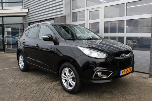 Hyundai ix35 - 2.0 CRDi Business Edition Navigatie Leder N.A.P - 1