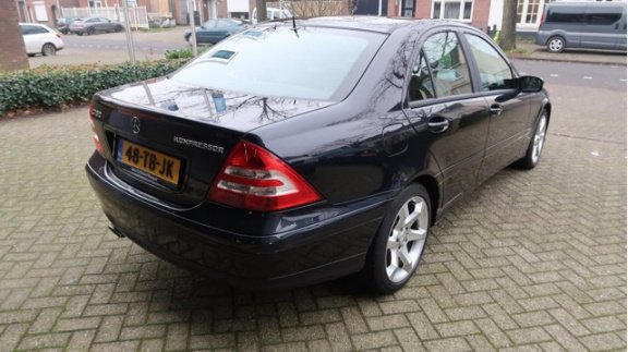 Mercedes-Benz C-klasse - 180 K. Classic 1STE EIGENAAR/LEER/NAP - 1