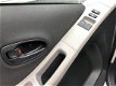 Toyota Yaris - 1.0 VVTi + Airco + Elektr. pakket - 1 - Thumbnail