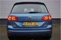Volkswagen Golf Sportsvan - 1.2TSI/111PK Trendline DSG · Airco · Cruise control · Wegklapbare trekha - 1 - Thumbnail