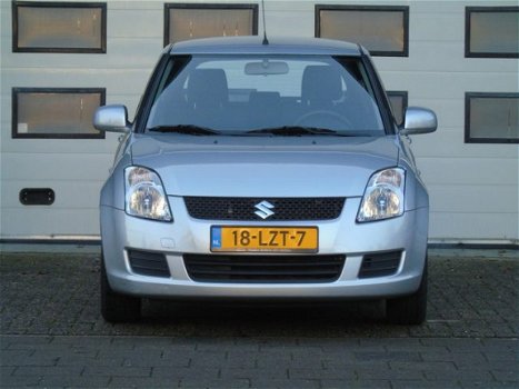 Suzuki Swift - 1.3 Cool - 1