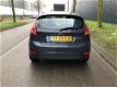 Ford Fiesta - 1.25 Champion Nap, Dealer Onderhouden, Airco, Aux - 1 - Thumbnail