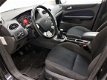 Ford Focus Wagon - 1.8-16V Ambiente Flexifuel MET NIEUWE APK Eerste eigenaar/Parkeersensoren achter - 1 - Thumbnail