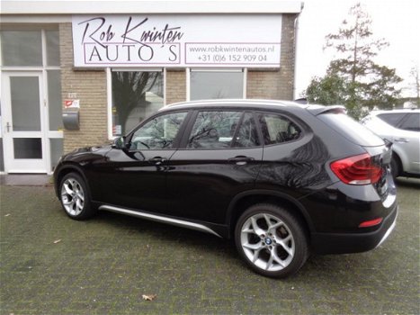 BMW X1 - SDrive16d Business 18 Inche LM velgen / Automatische Airconditioning / Leder interieur - 1