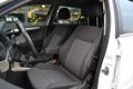 Opel Astra Wagon - 1.6 Business | Airco | Cruise | Donker glas | Trekhaak | - 1 - Thumbnail
