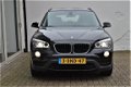 BMW X1 - SDrive20d High Executive panorama schuifdak, sportstoel, trekhaak, 184 pk Sport 2.0 - 1 - Thumbnail