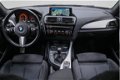 BMW 1-serie - 118i M Sport Cruise Control Navigatie Climate Control Parkeersensoren achter Licht met - 1 - Thumbnail